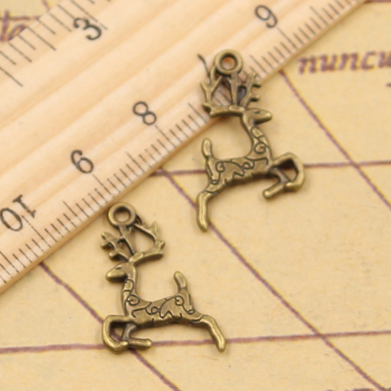 クリスマスチャーム22x14mm,アンティークペンダント,手 - Vintage Fashion Finds のレビューと価格